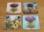 Load image into Gallery viewer, Geoff Foord Set of 4 Scottish Thistle Coasters tied with Tartan Ribbon
